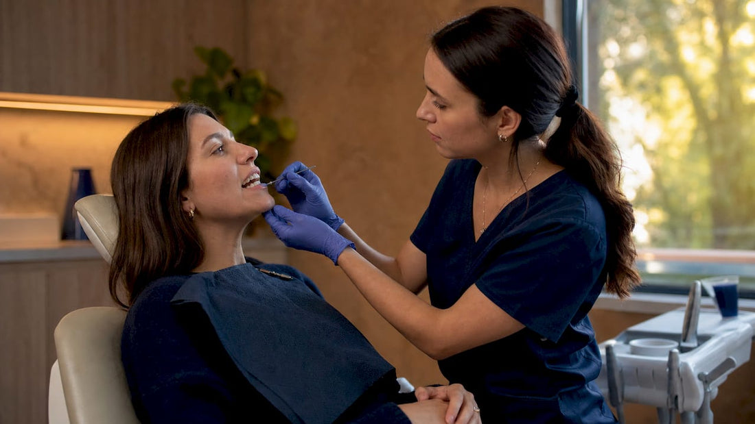Patient receiving professional teeth whitening treatment