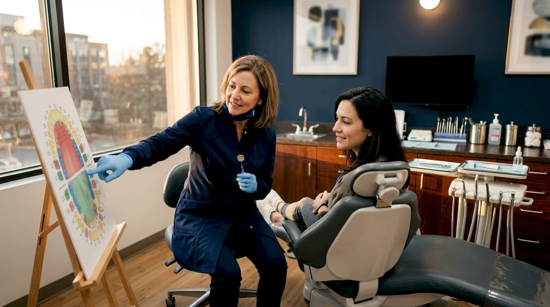 Dentist consulting patient about teeth whitening safety