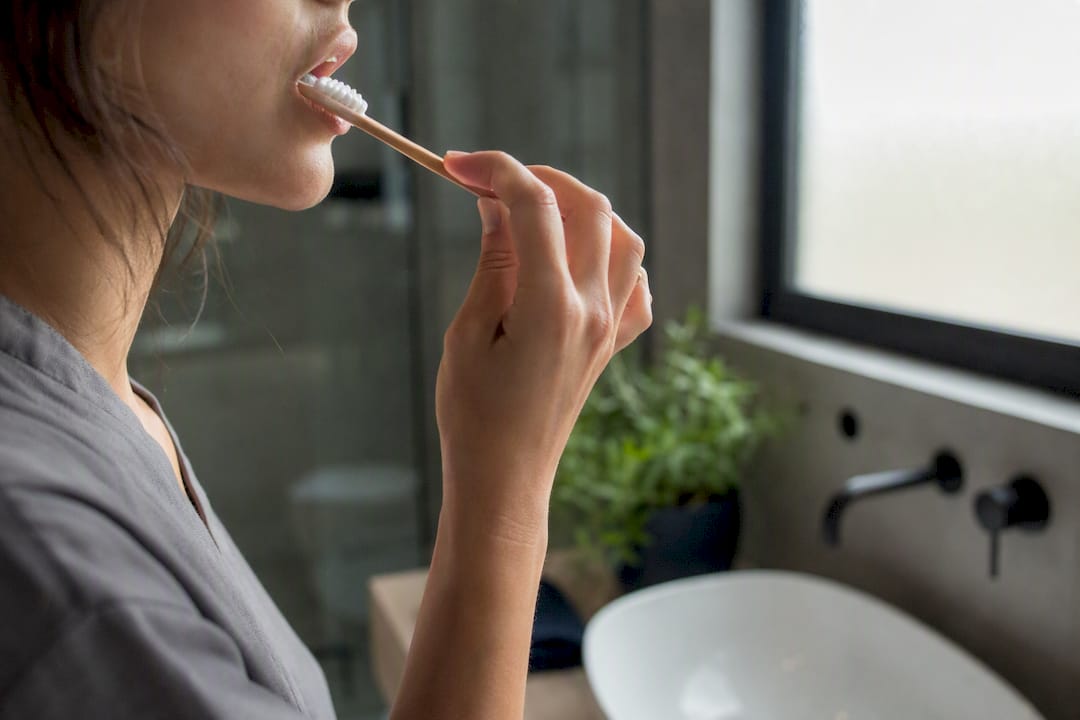 Close-up of teeth brushing with baking soda