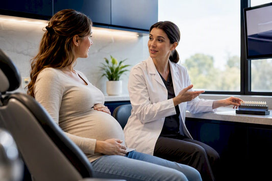 Pregnant patient discussing whitening with dentist